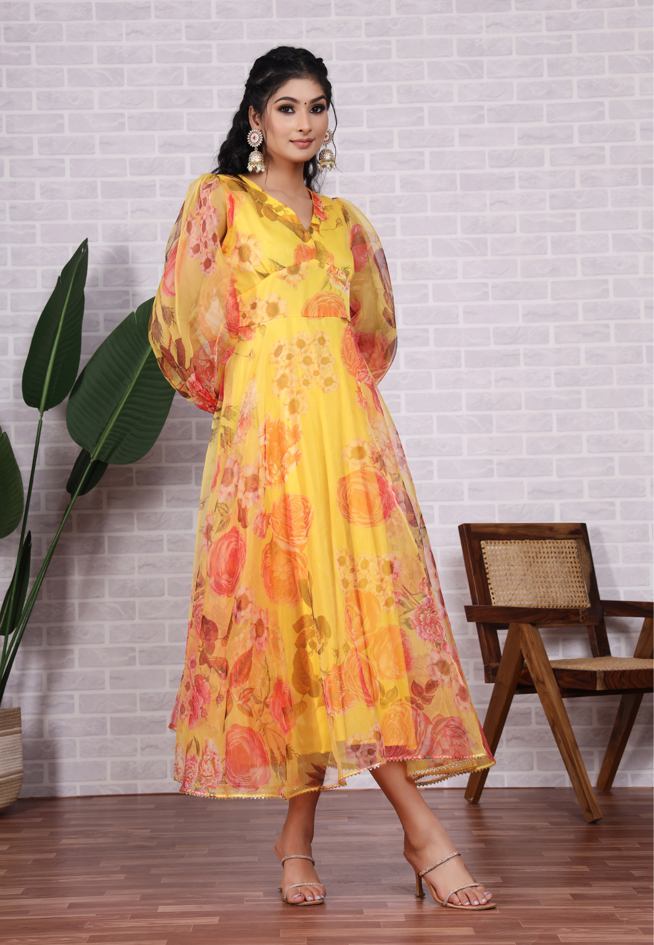 Feel Radiant in Yellow Organza with Beautiful Blossoms and Sheer Grace