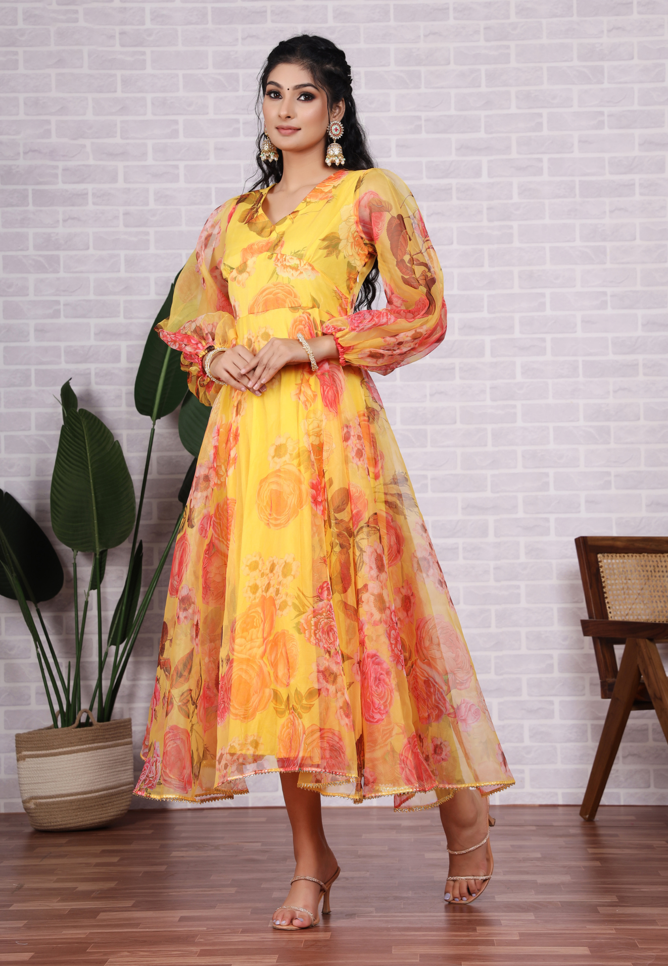 Feel Radiant in Yellow Organza with Beautiful Blossoms and Sheer Grace