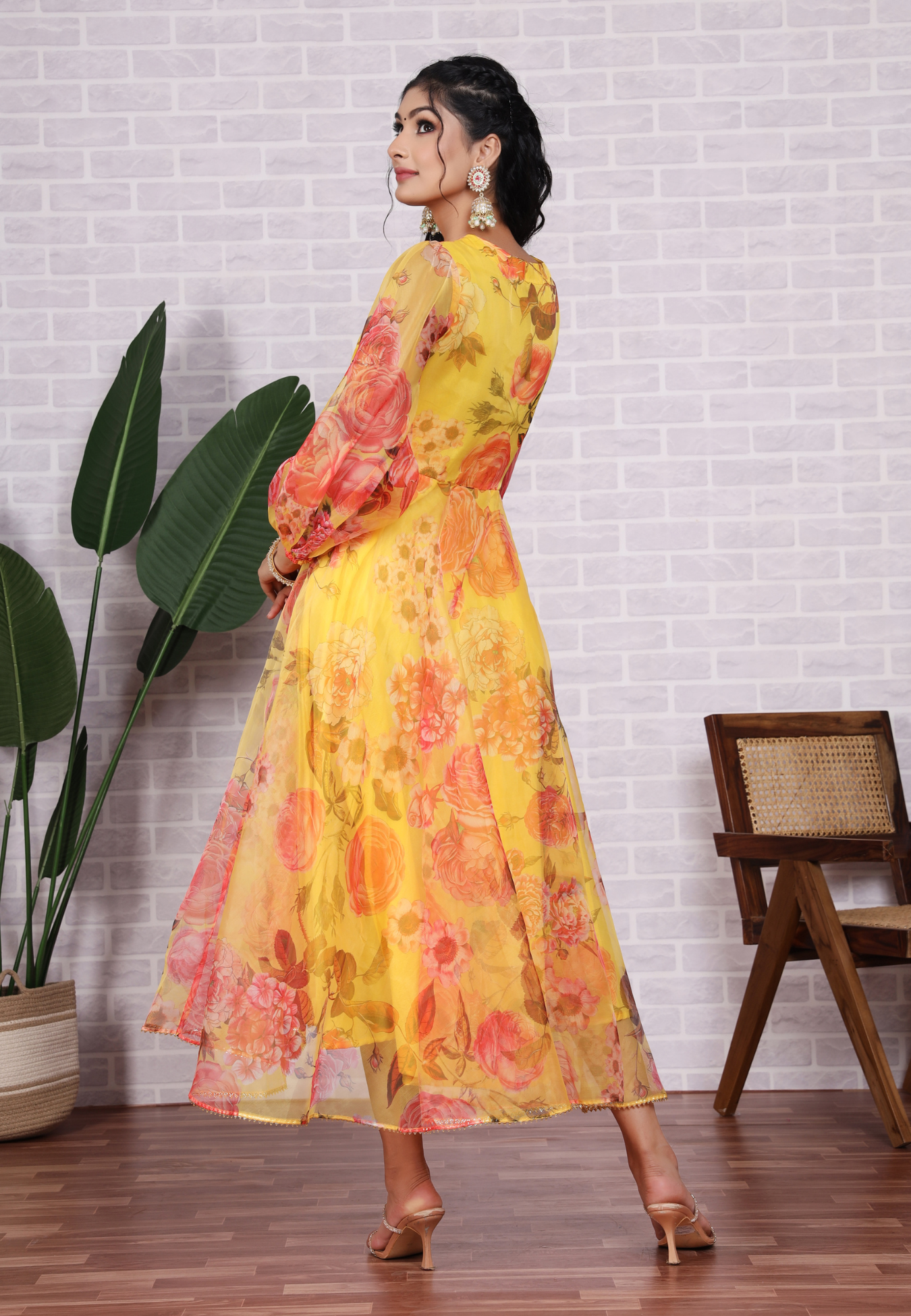 Feel Radiant in Yellow Organza with Beautiful Blossoms and Sheer Grace