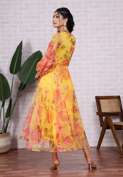 Feel Radiant in Yellow Organza with Beautiful Blossoms and Sheer Grace
